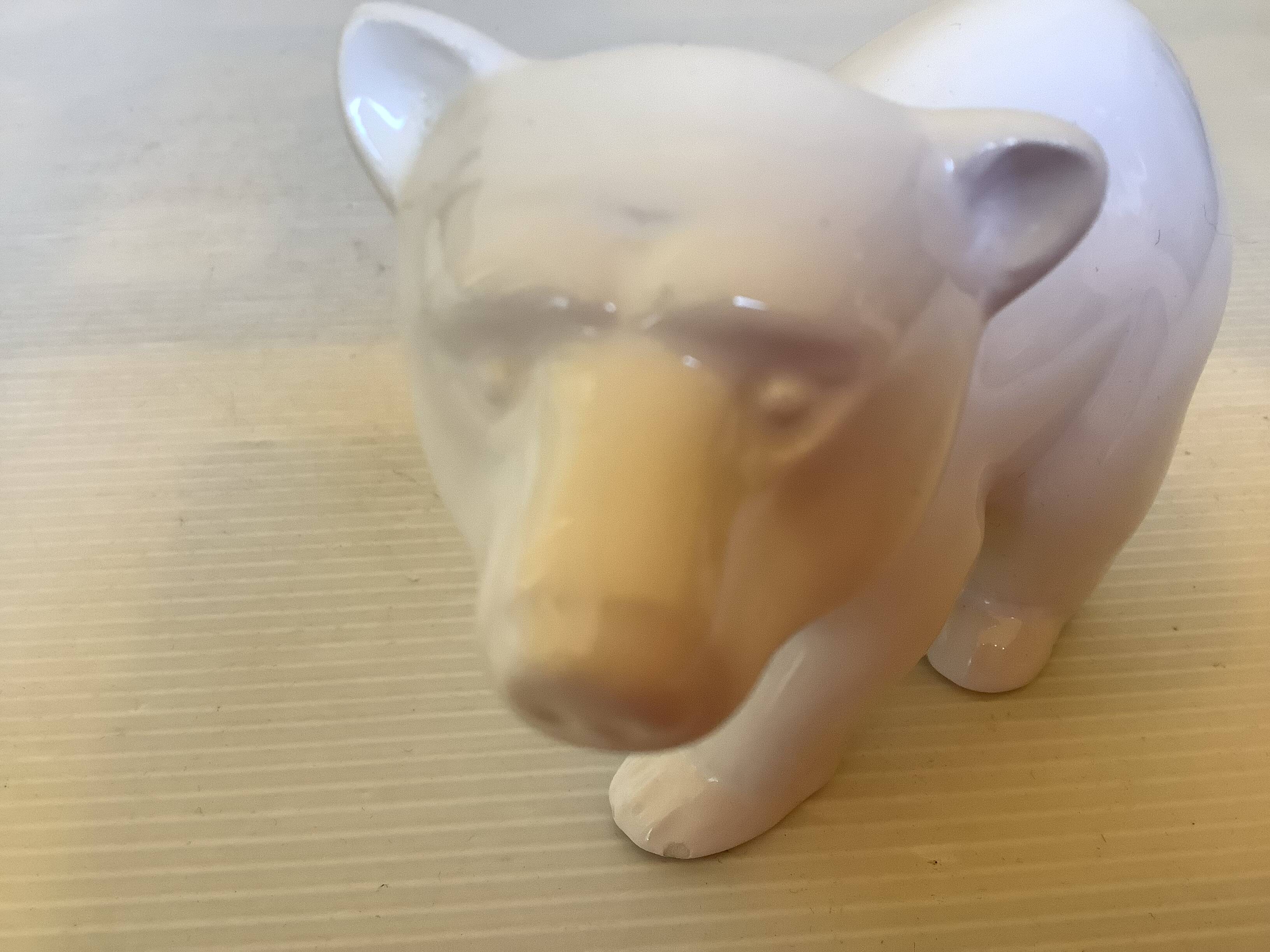 Three signed white polar bears