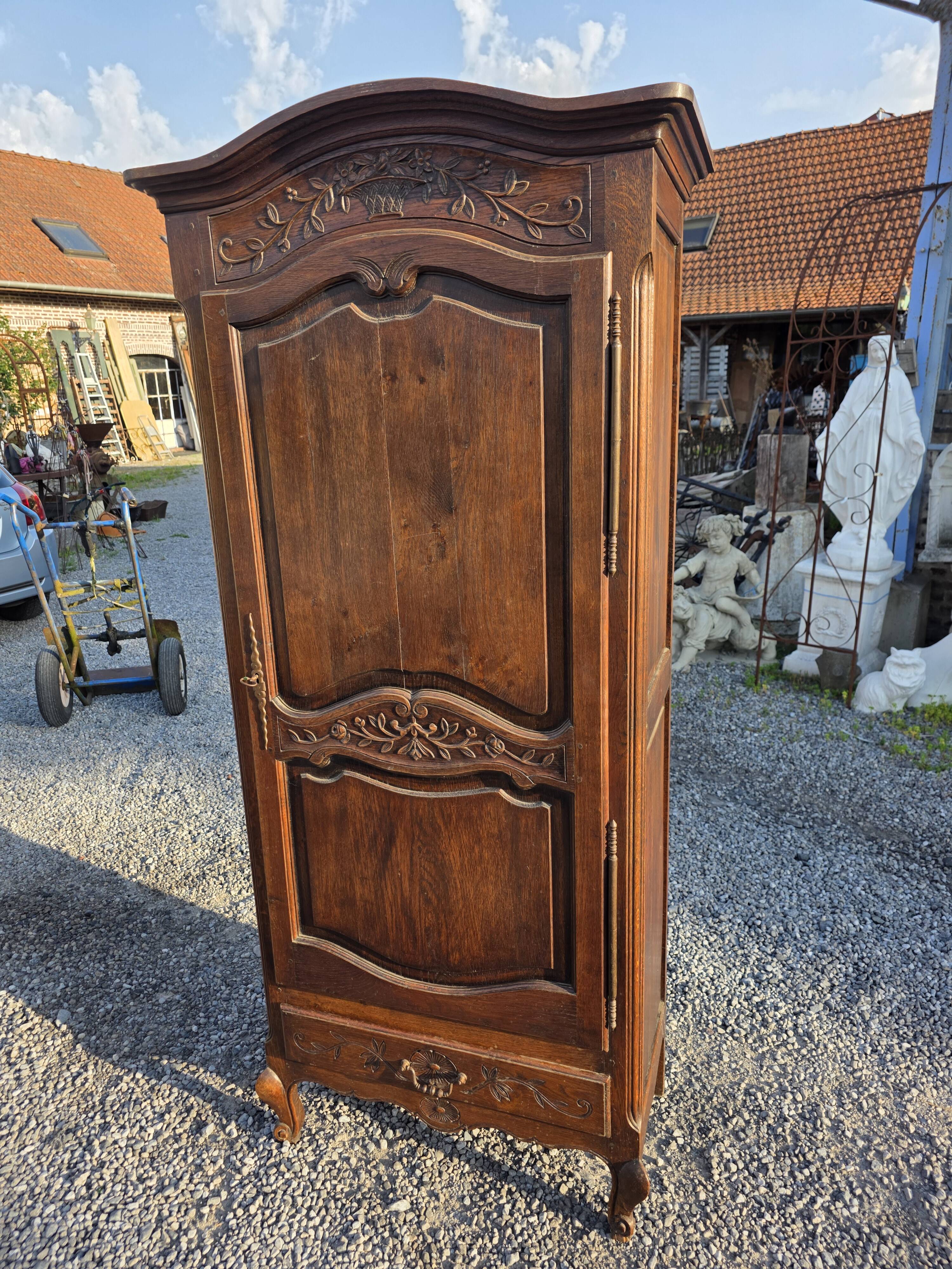 Louis XV style bonnetière in solid oak