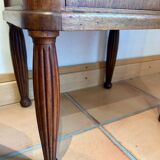 Antique bedside table in wood and marble – adorned with gilded brass ornaments –