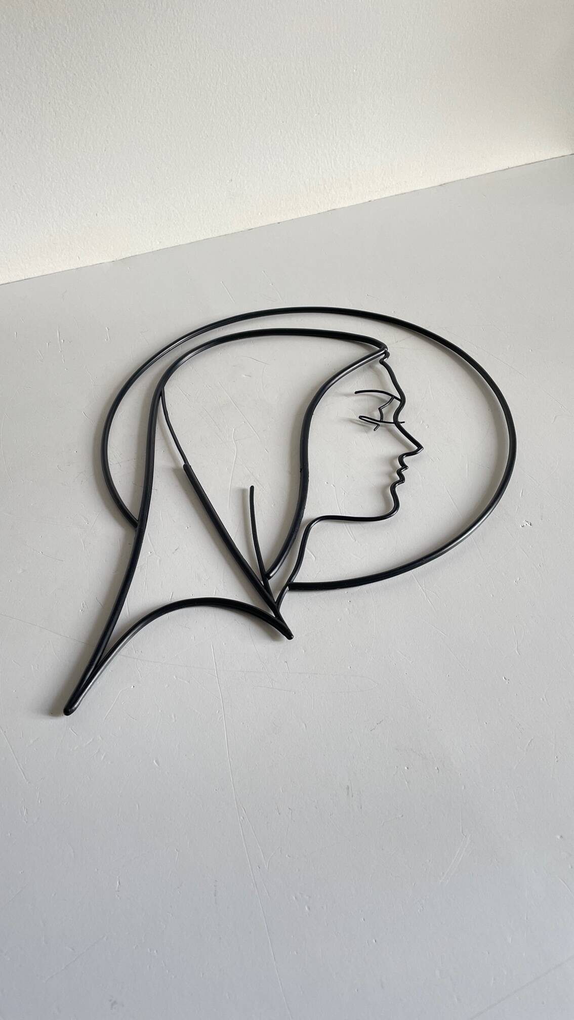Vintage modernist wall decoration image of Saint.