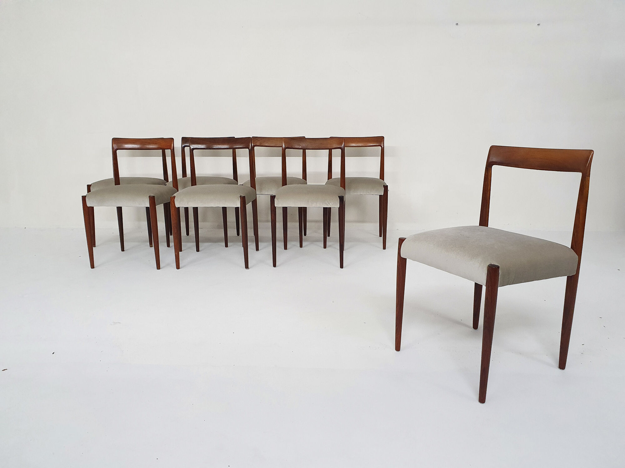 Set of eight rosewood dining chairs by Lubke, Germany 1960's
