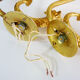 Pair of wall lamps with carp fish, brass and white opaline globe 1960