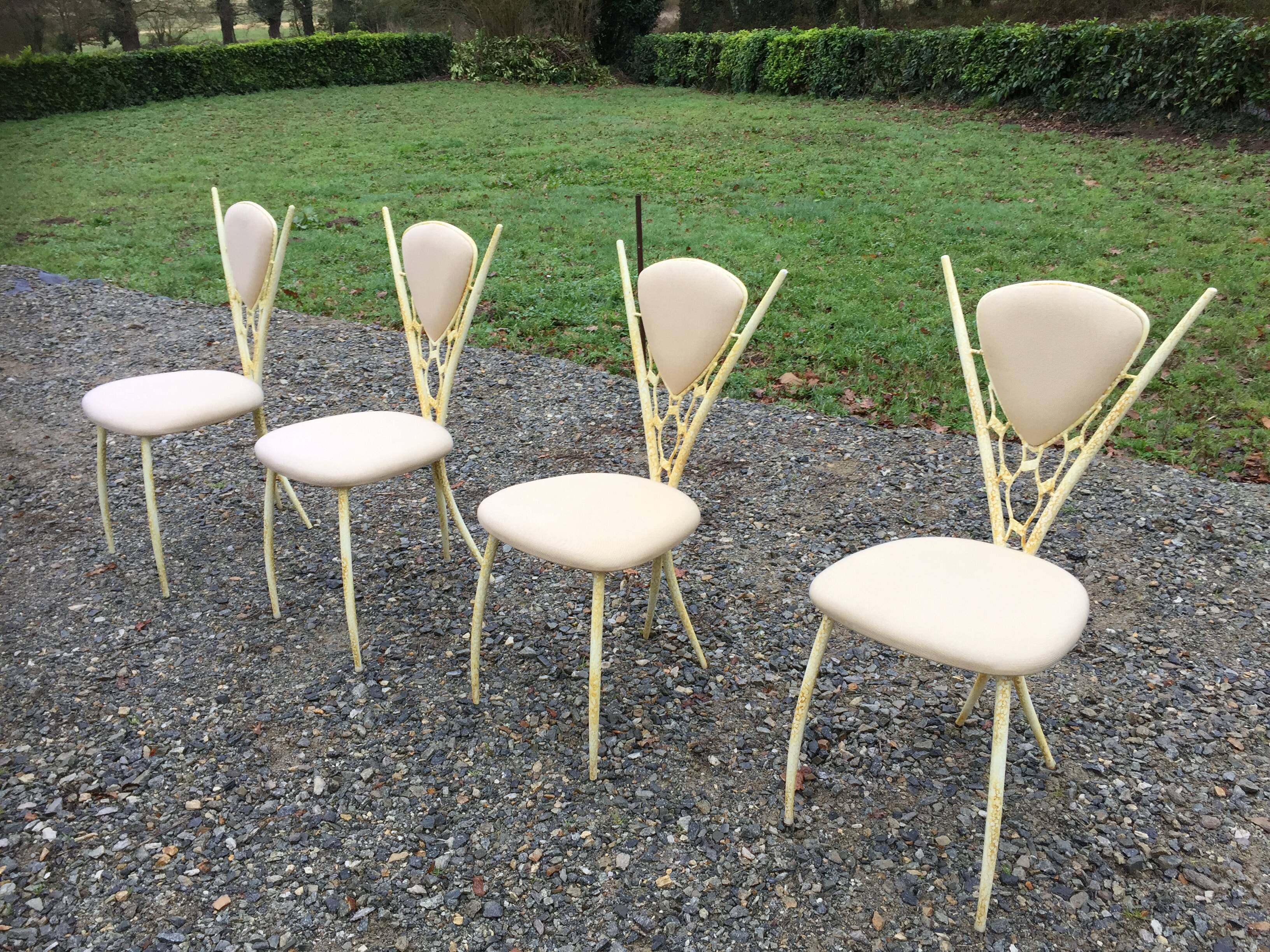 4 vintage chairs in tubular metal lacquered white yellow.