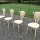 4 vintage chairs in tubular metal lacquered white yellow.
