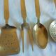 Set of brass kitchen utensils. Early XXeme