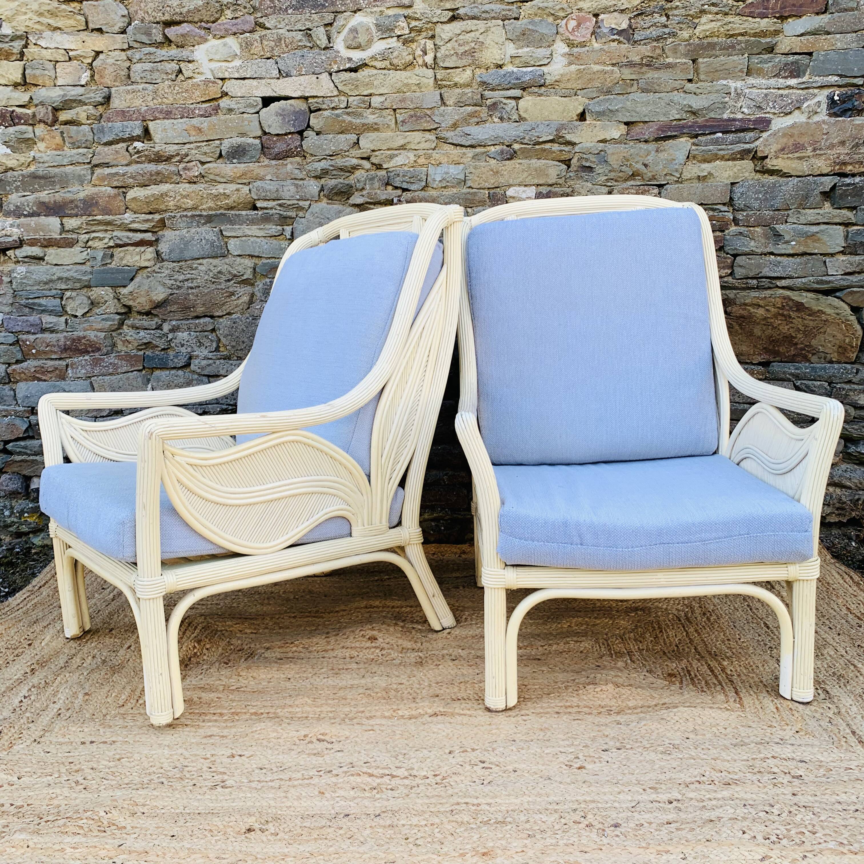 Pair of white rattan armchairs