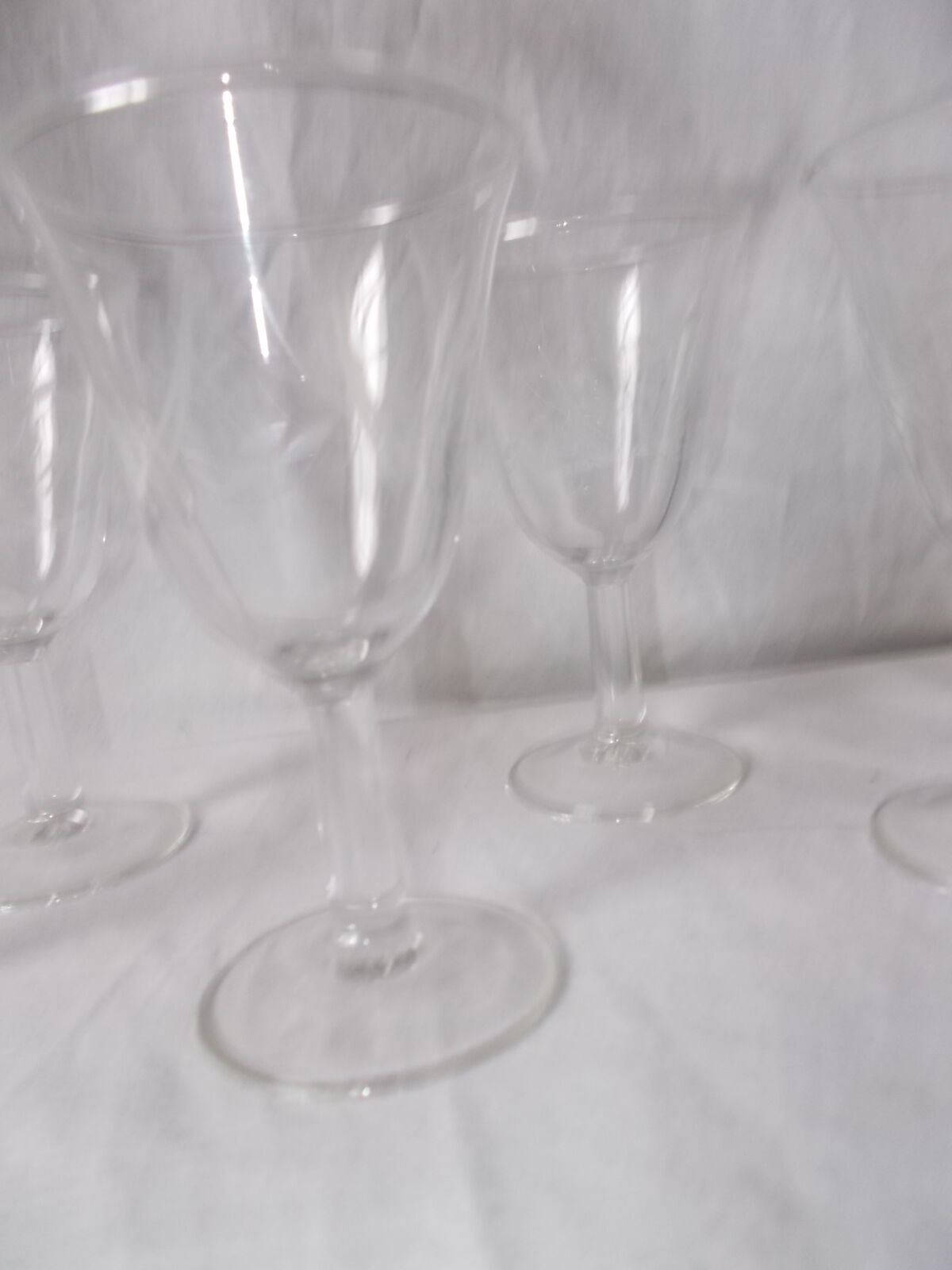 Set of 6 antique decorated wine glasses.