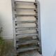 Workshop staircase in vintage raw wood
