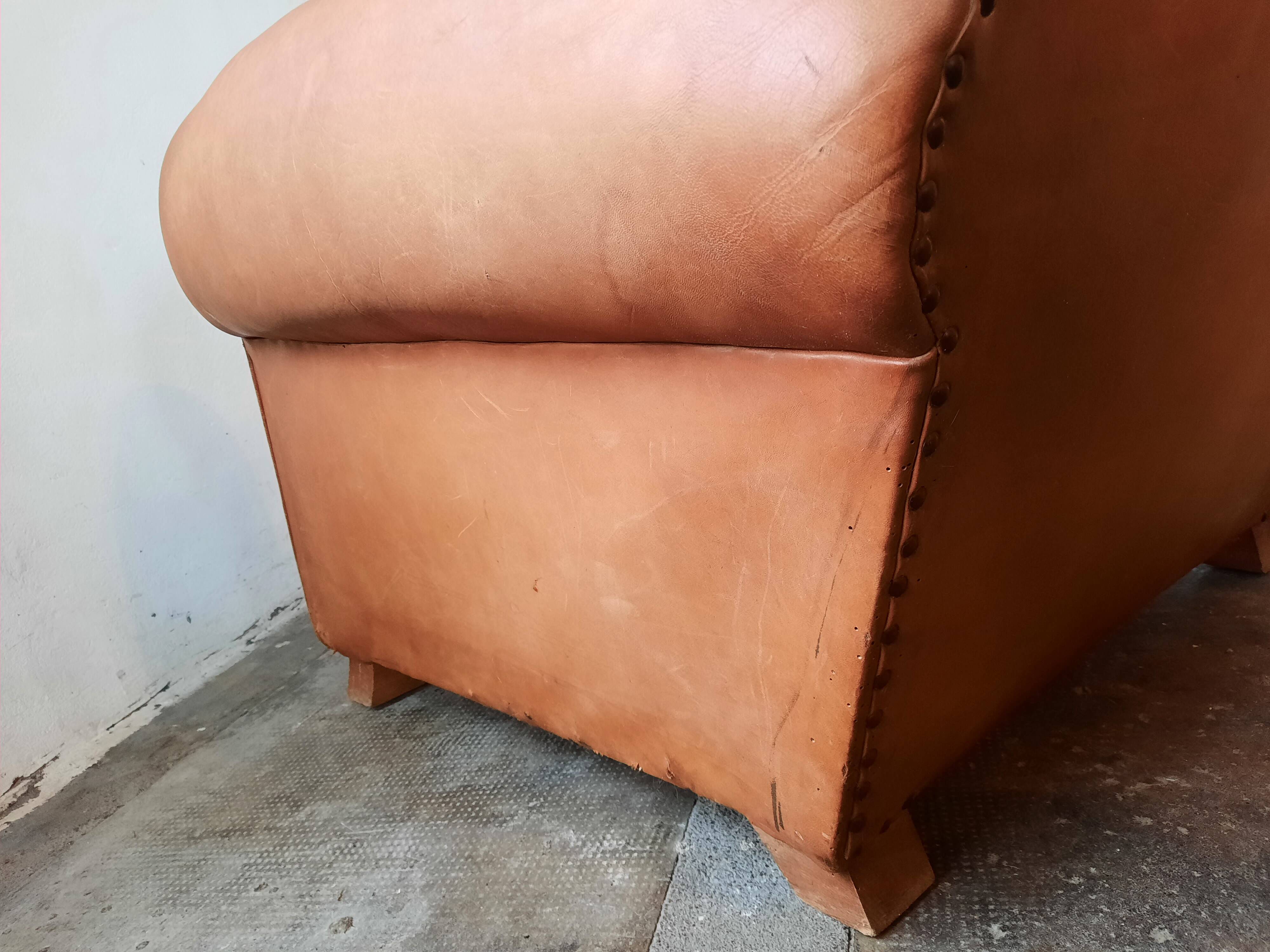 Old leather club chair 1940-1950