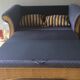 Vintage colonial-style rattan sofa bed