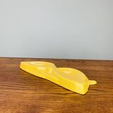 Vintage yellow ceramic glasses emptier