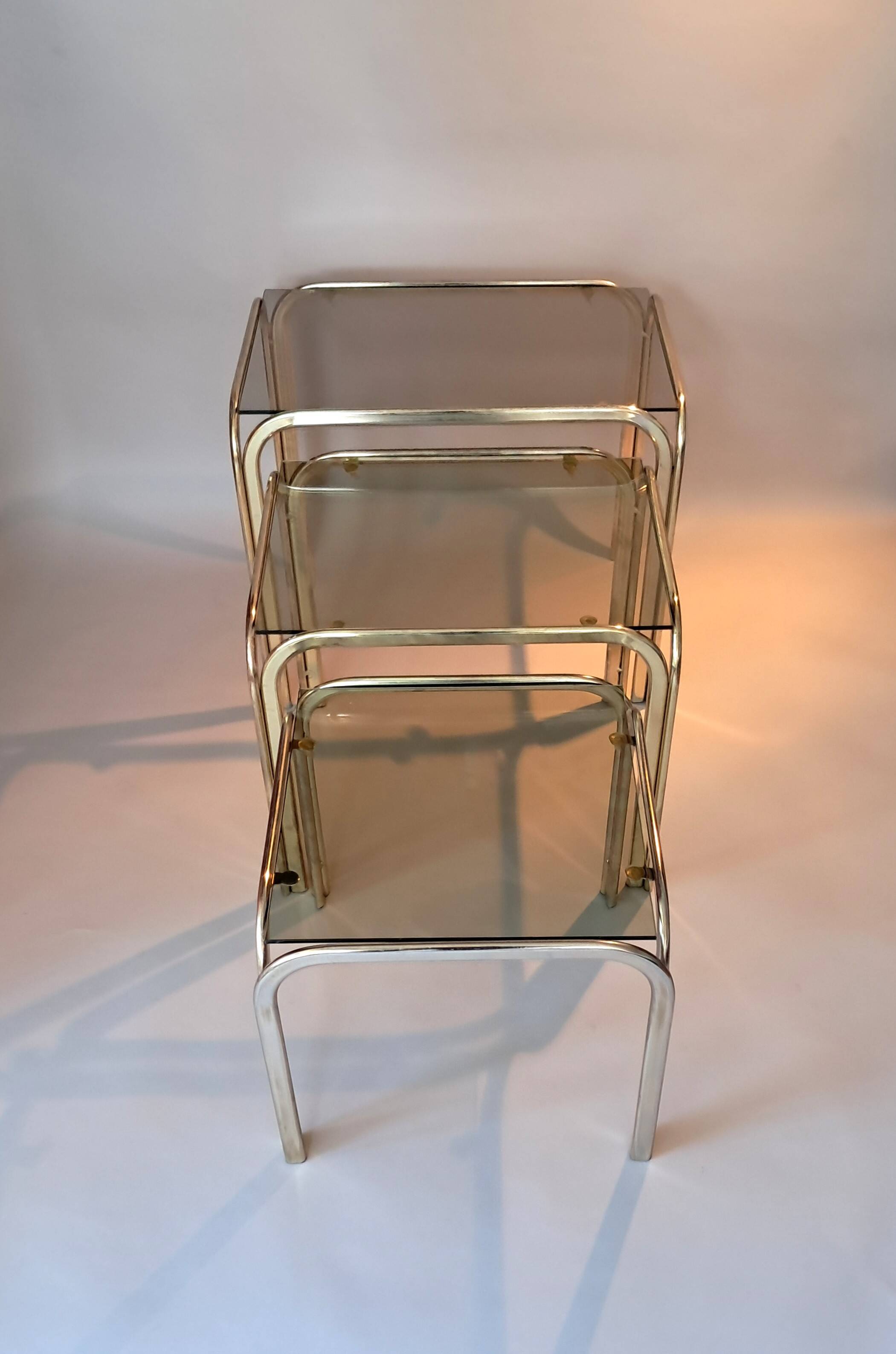 3 vintage golden nesting tables with smoked glass.