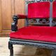 Large Japanese-style sofa in carved wood and red velvet, 19th century