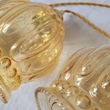 Duo of amber molded glass pendant lights