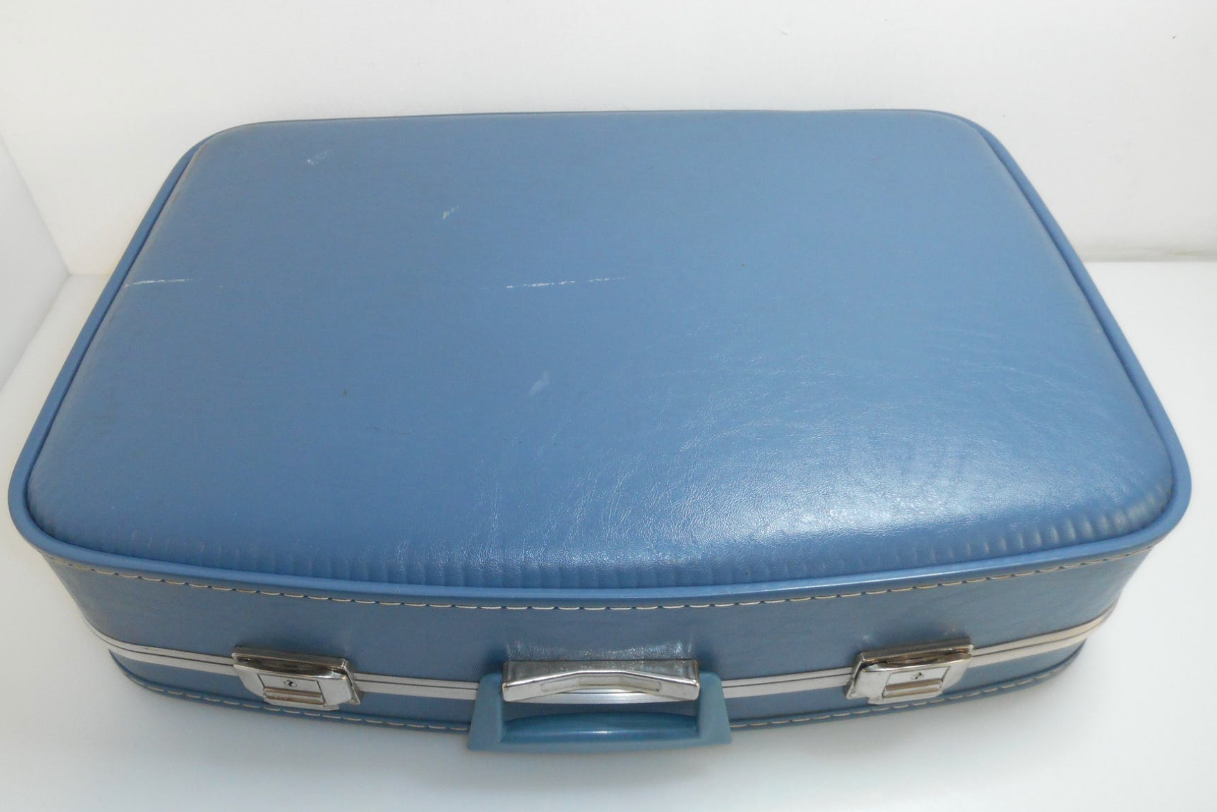 1960s flight attendant and vanity suitcases