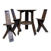 Brutalist style table and chairs, wine cellar.