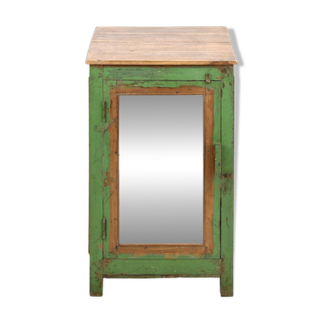 Showcase on patinated wooden legs