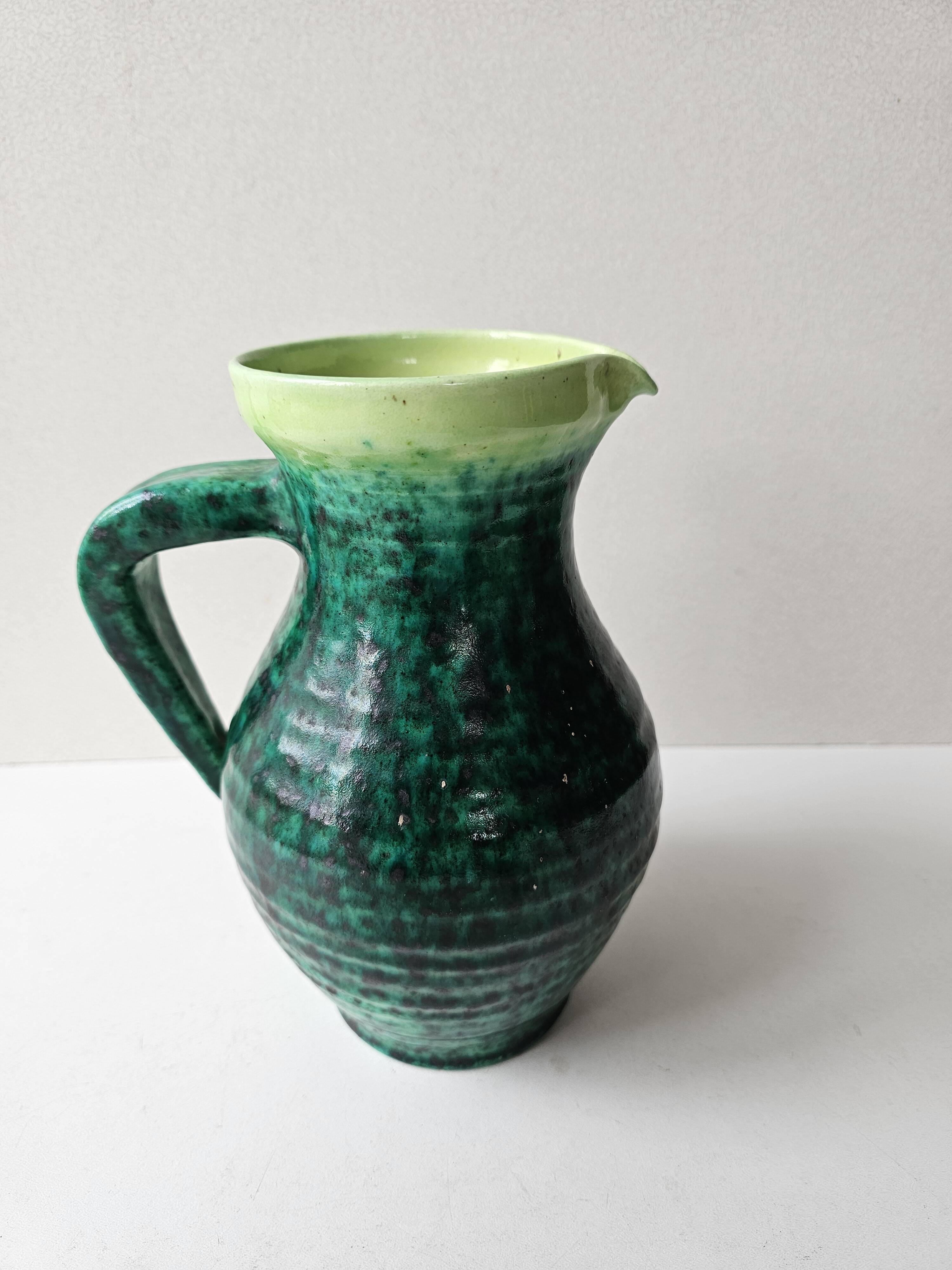 Green glazed ceramic pitcher Signed ACCOLAY