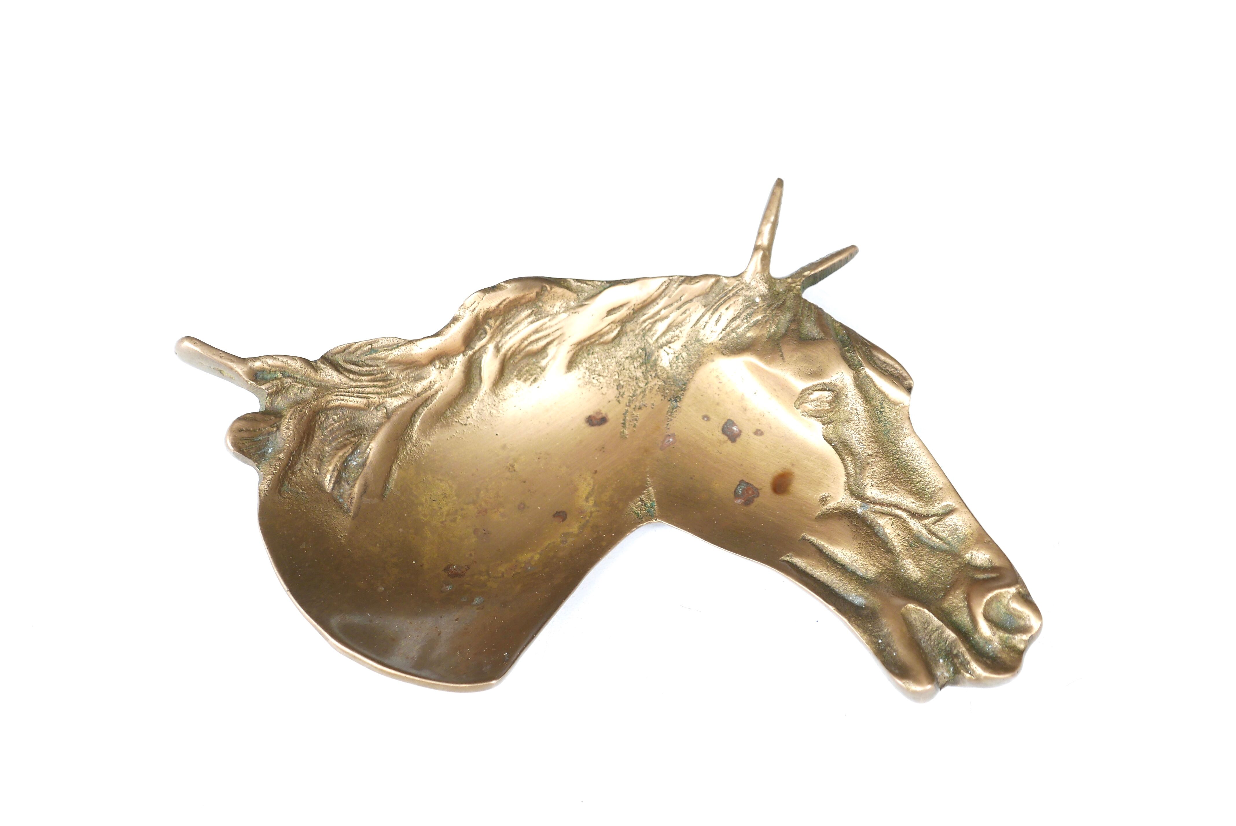 Brass cup in horse-shaped shape, 70s