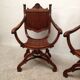 Pair of antique armchairs curules called Dagobert in carved wood