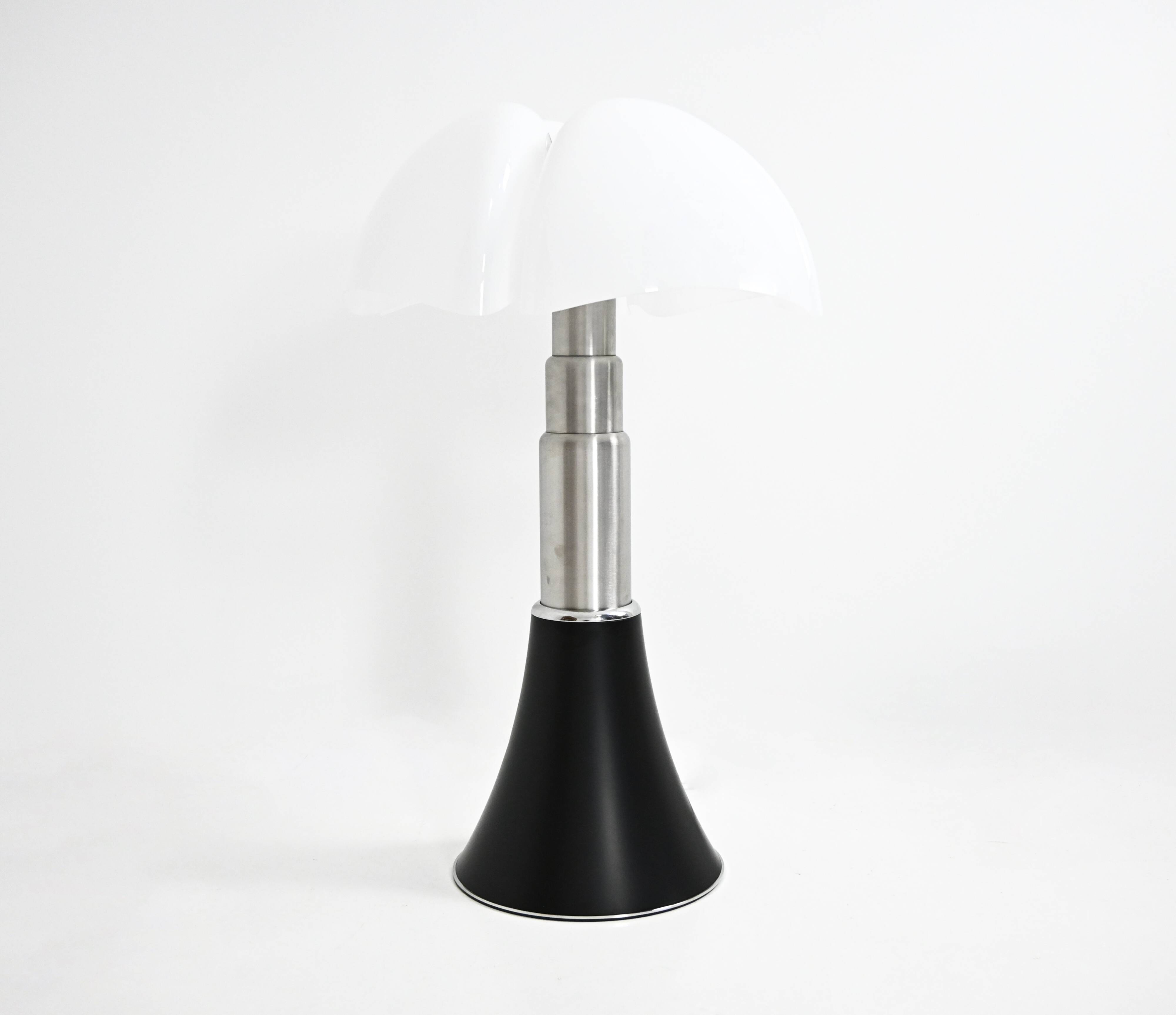 Black "Pipistrello" table lamp by Gae Aulenti for Martinelli.