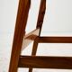 Teak armchair with leather upholstery