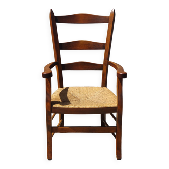 solid wood armchair, straw-covered seat