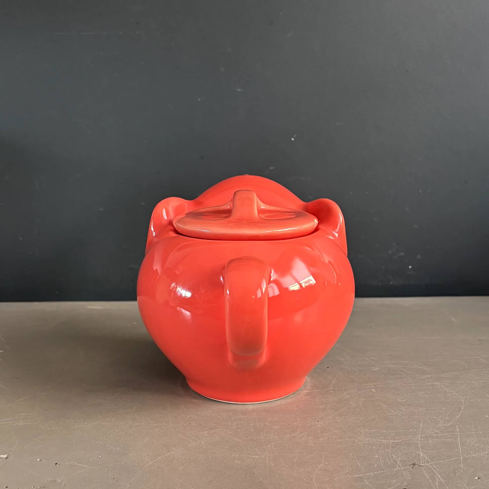 Large coral-coloured elephant teapot.