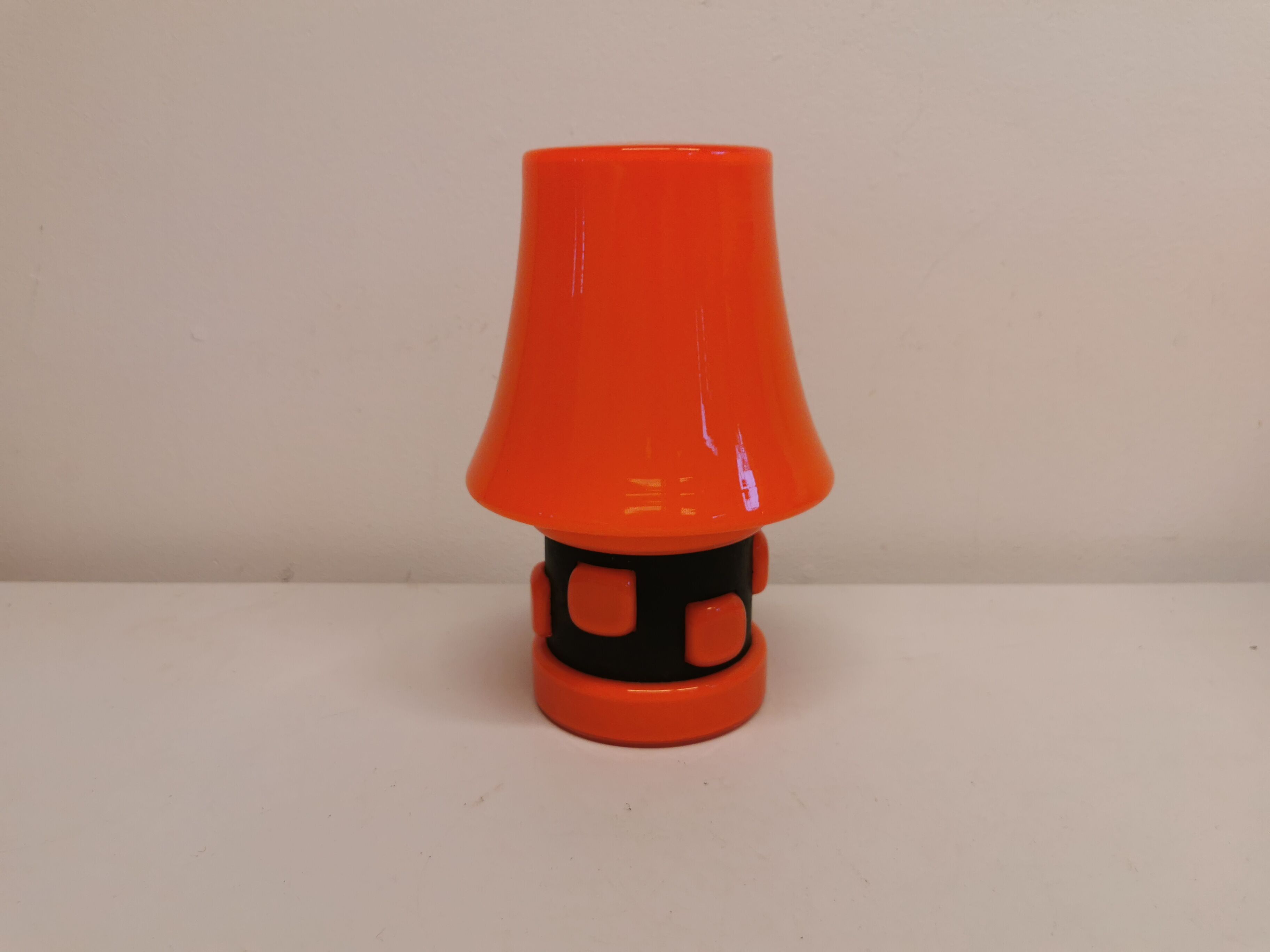 Table lamp, made in red double layer glass with metal details. estimated from the 1960s