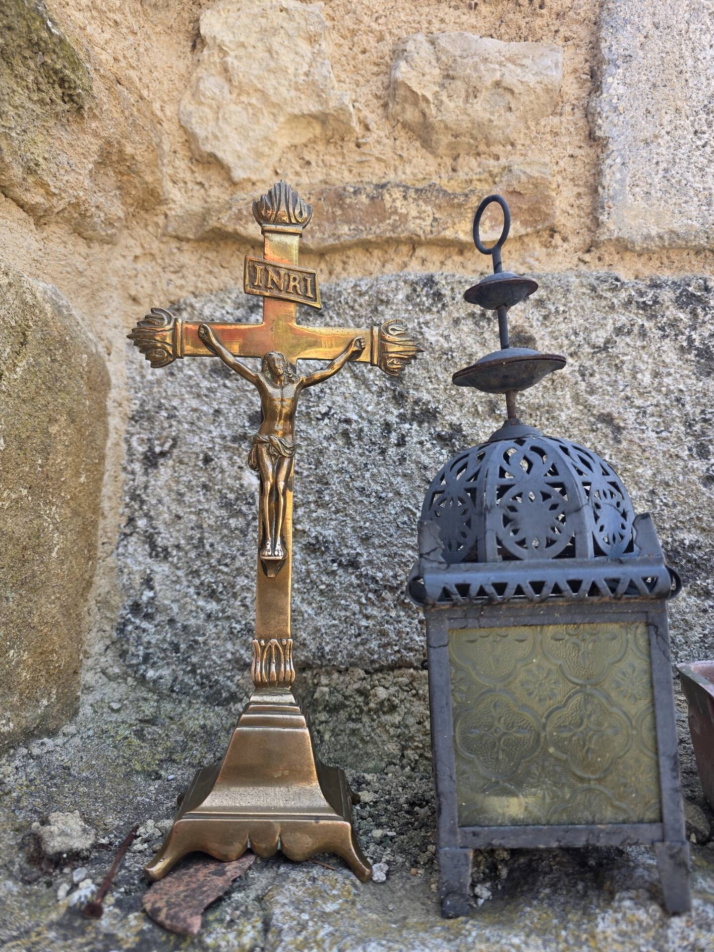19th-century brass crucifix on a base