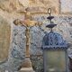 19th-century brass crucifix on a base