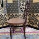 Suite de 8 chaises de bistrot en cannage FISCHEL