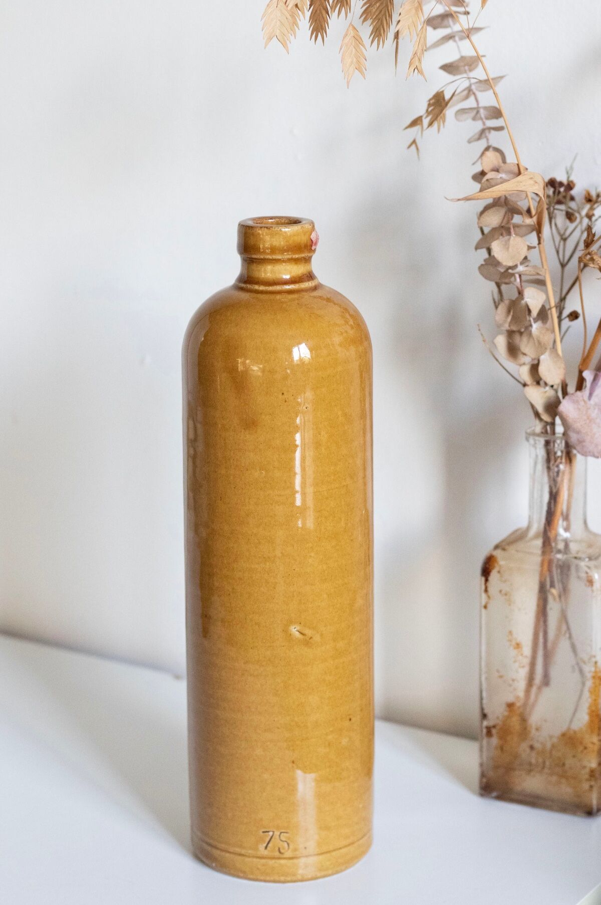 Enamelled stoneware bottle