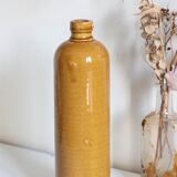 Enamelled stoneware bottle