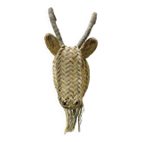 Trophy animal head in palm leaves - Buffalo