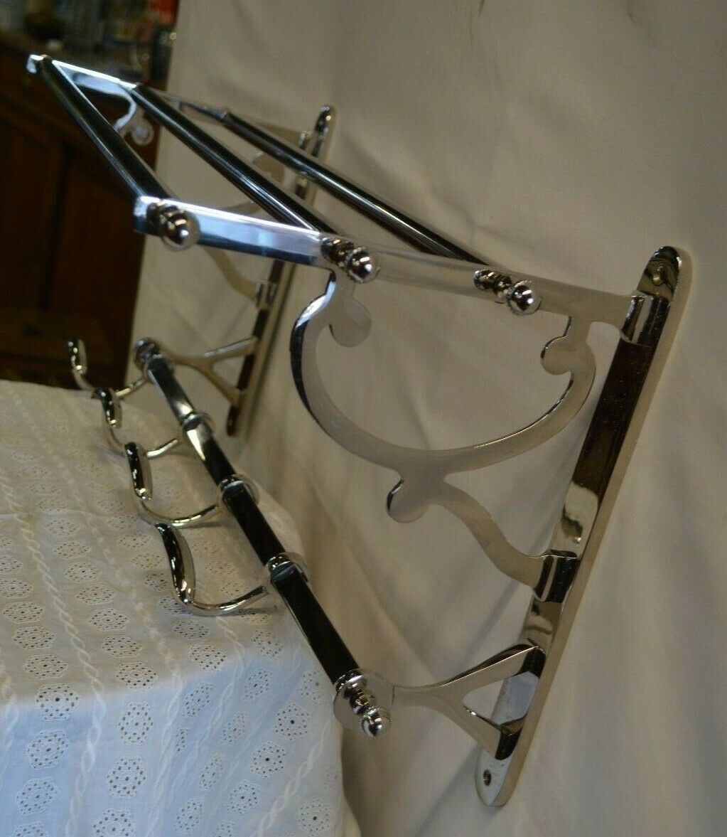Chrome iron coat rack with hat holder