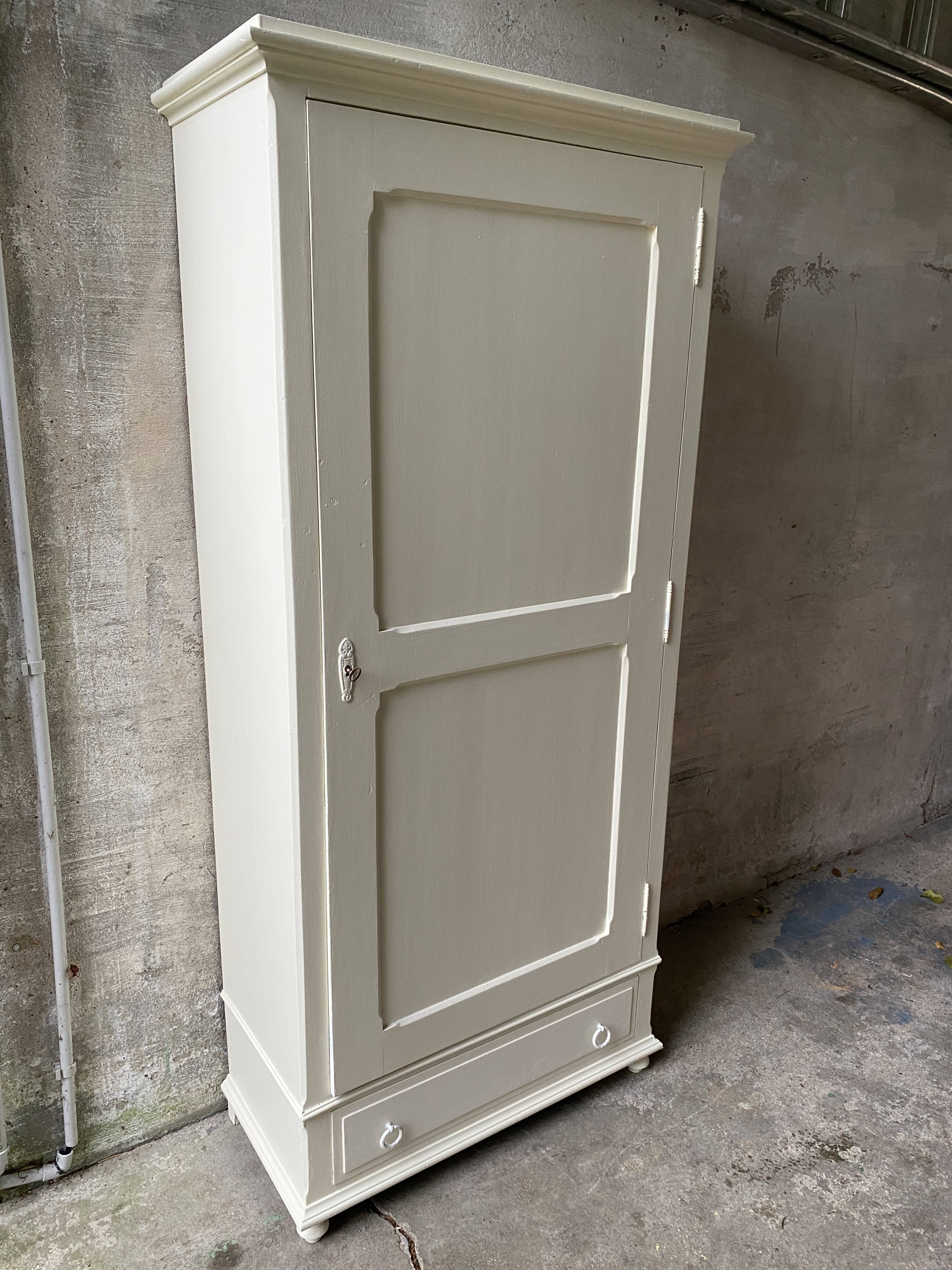 Vintage Parisian wardrobe, pale yellow lacquer, one door, three shelves, one drawer