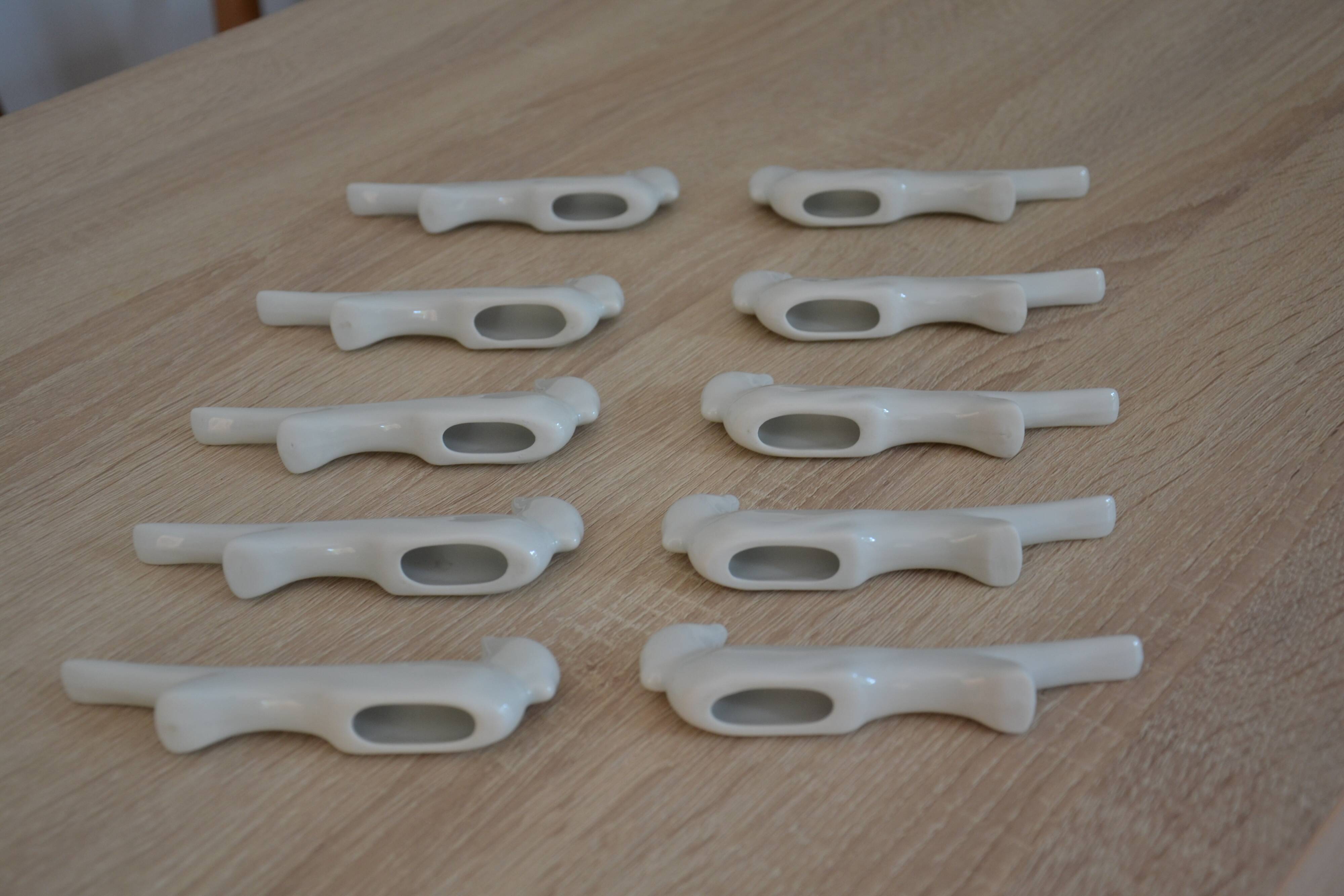 10 ceramic "bird" knife rests