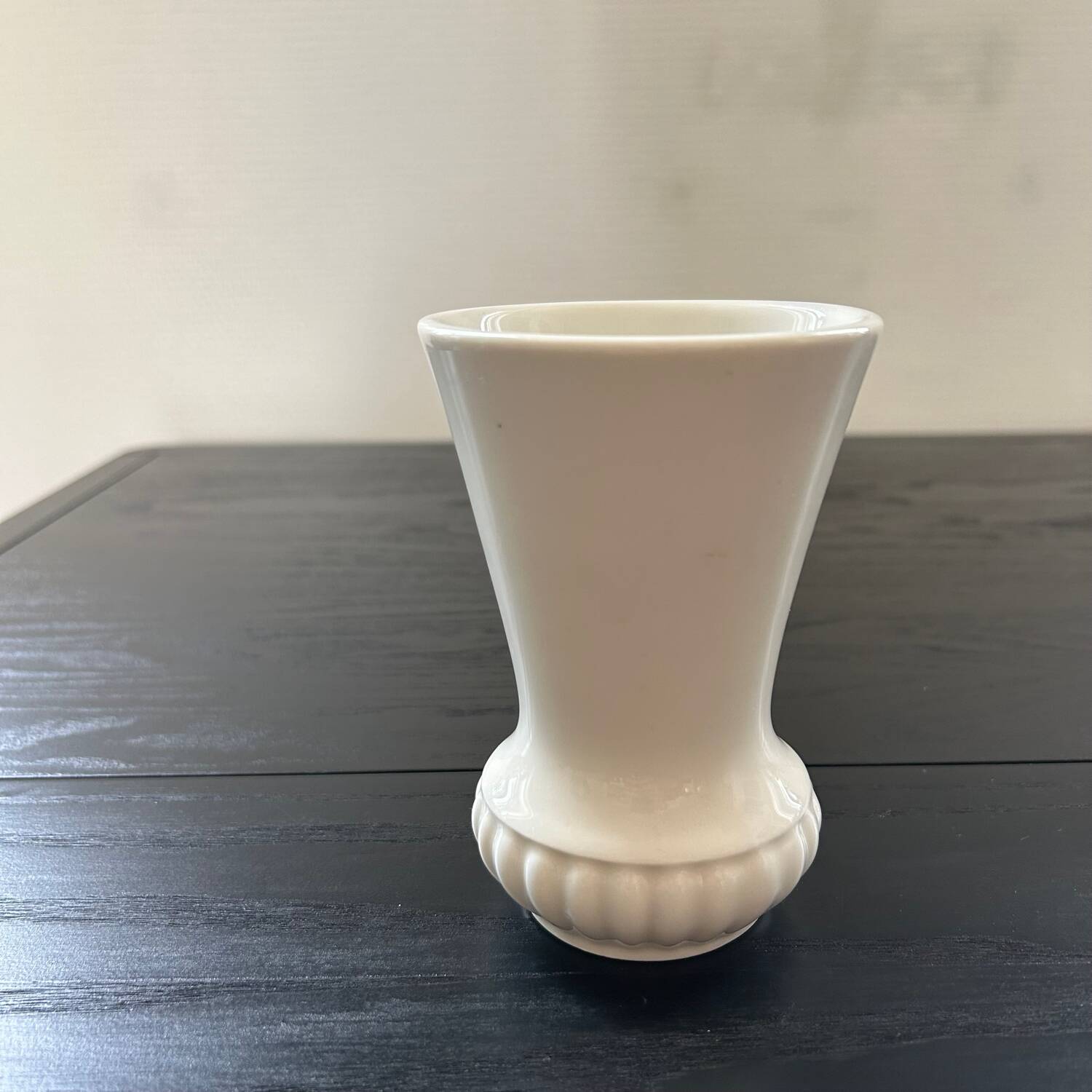 Small ribbed white vase