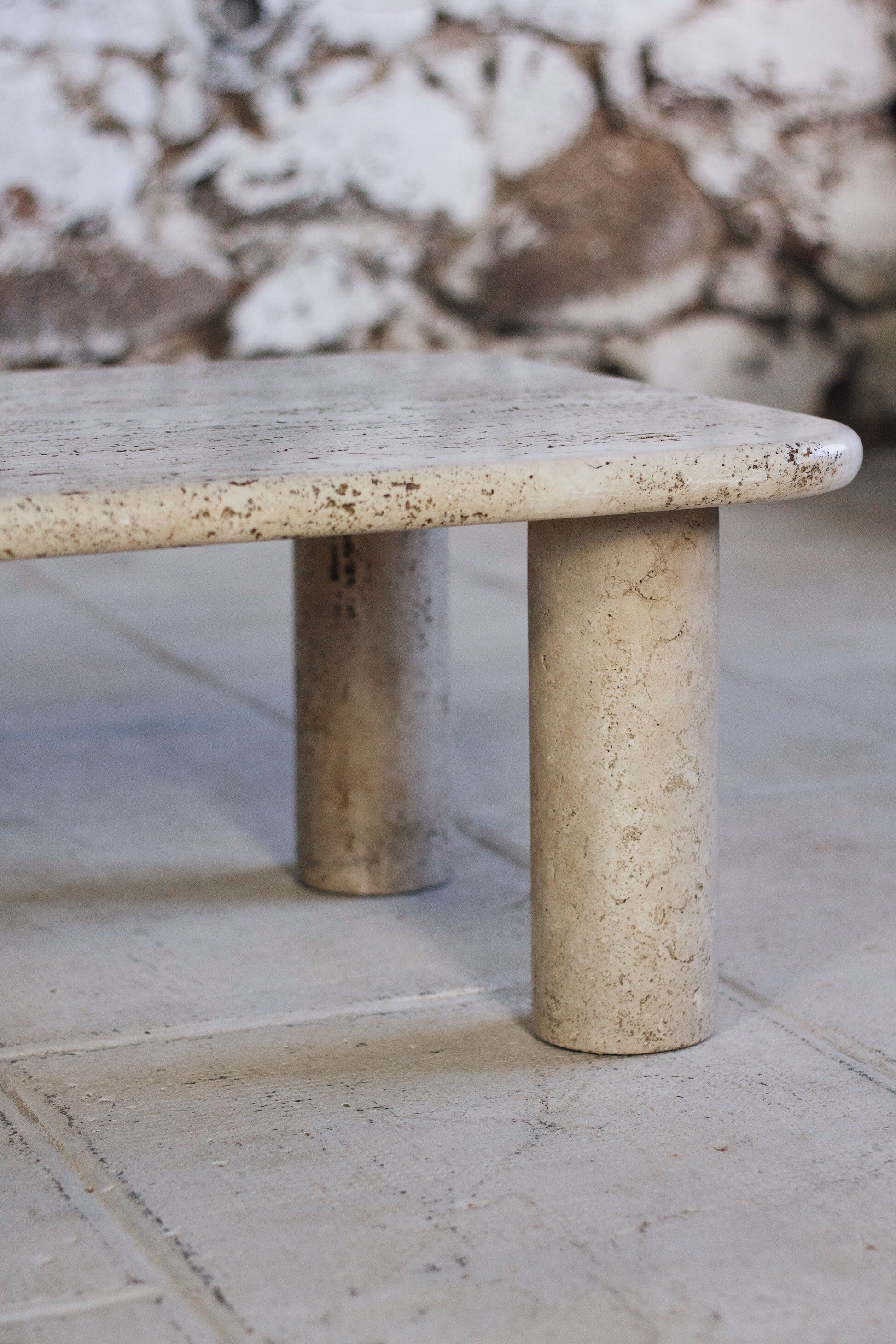 Travertine coffee table in the style of Angelo Mangiarotti, 1970.