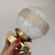 Vintage glass globe wall or ceiling light in white and gold from Clichy.