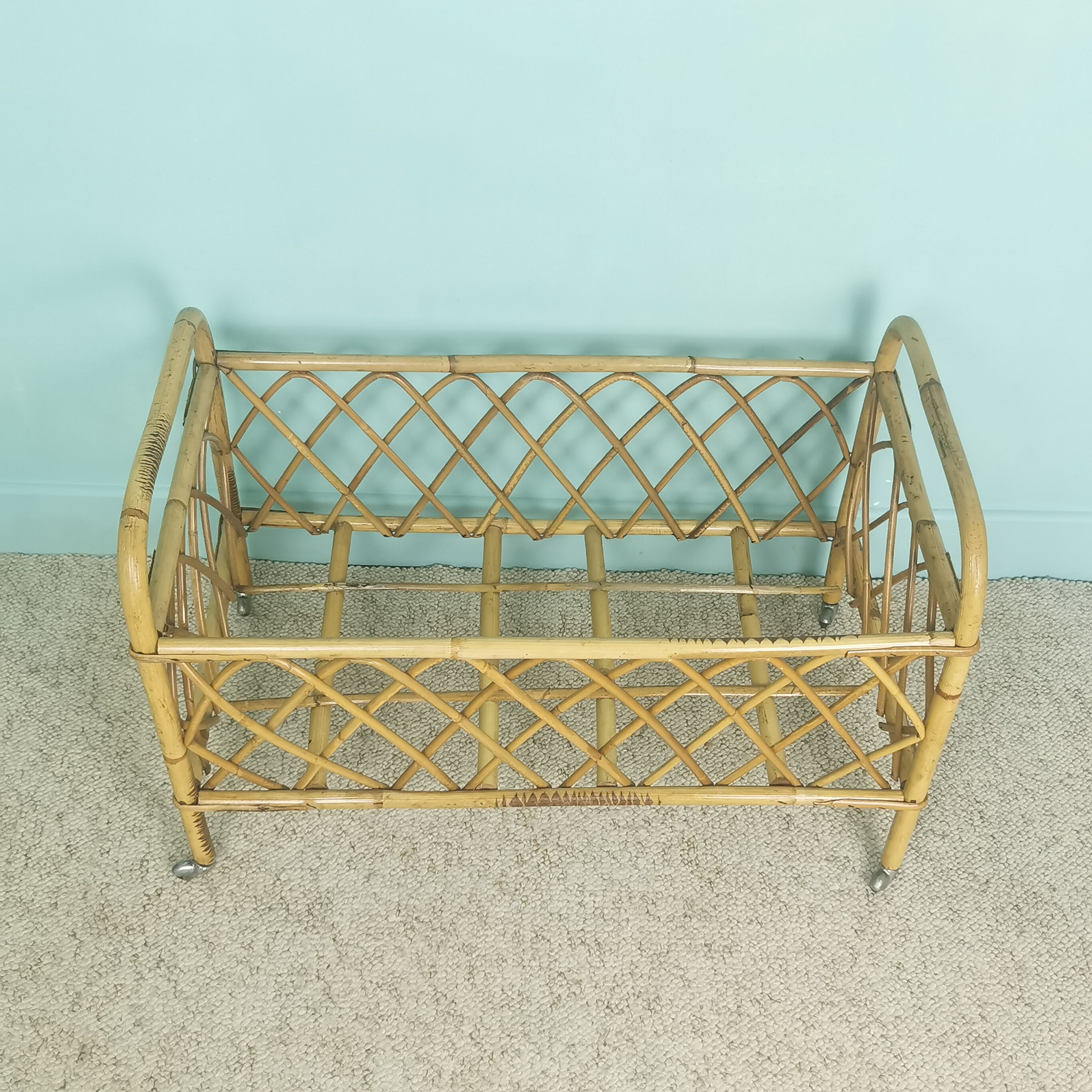 Rattan doll bed