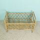 Rattan doll bed