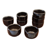 Set of 8 black ceramic cups signed