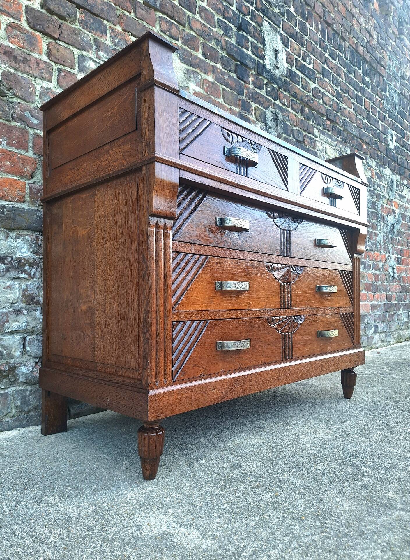 Art Deco commode with marble top, vintage antique furniture.