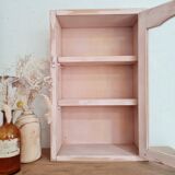 Medicine cabinet in patinated pink wood