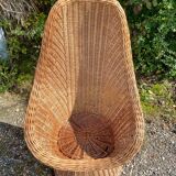 Rattan armchair and its cushion, 1960