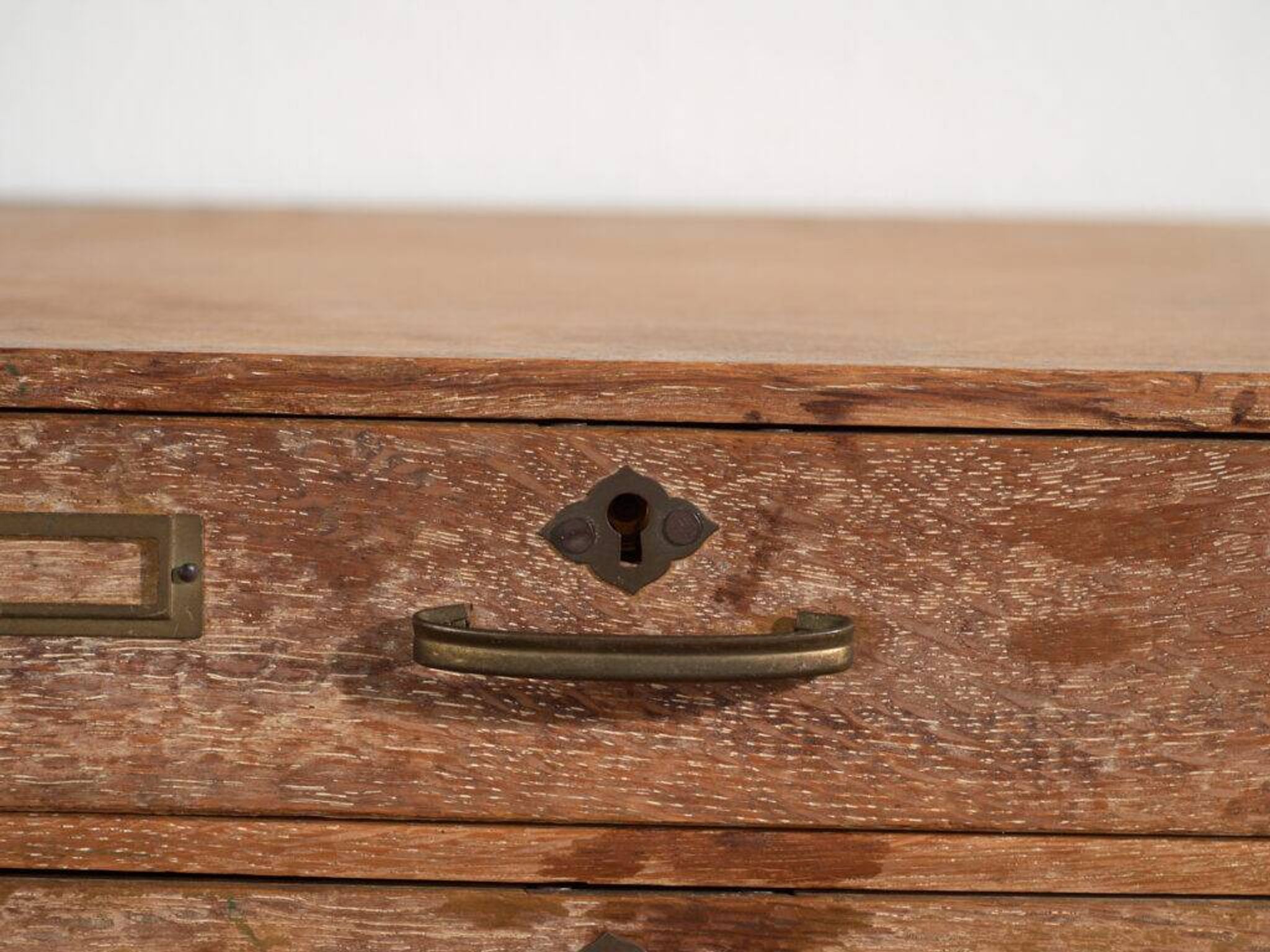Small Japanese desk chest in oak and red pine, mid-Showa period, circa 1945–1970.