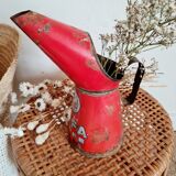 Red metal canister pot