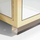 Brass sideboard with mirror and plexiglass legs by Michel Pigneres, 1970